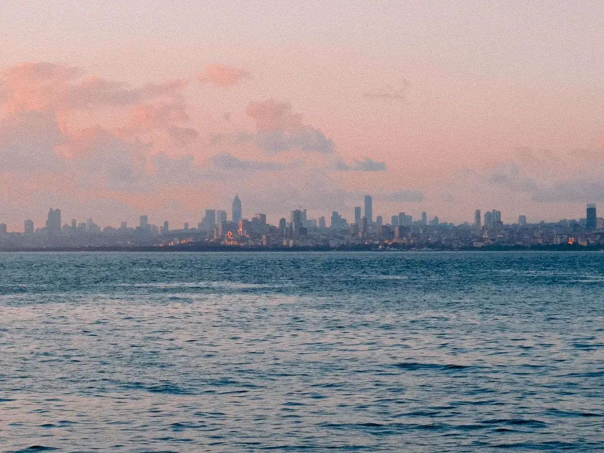 Mumbai skyline at dusk with a pink sky